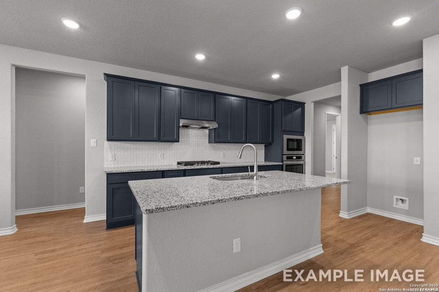 Furnished interior view inside a new home in Potranco Oaks, Castroville (Image 13).