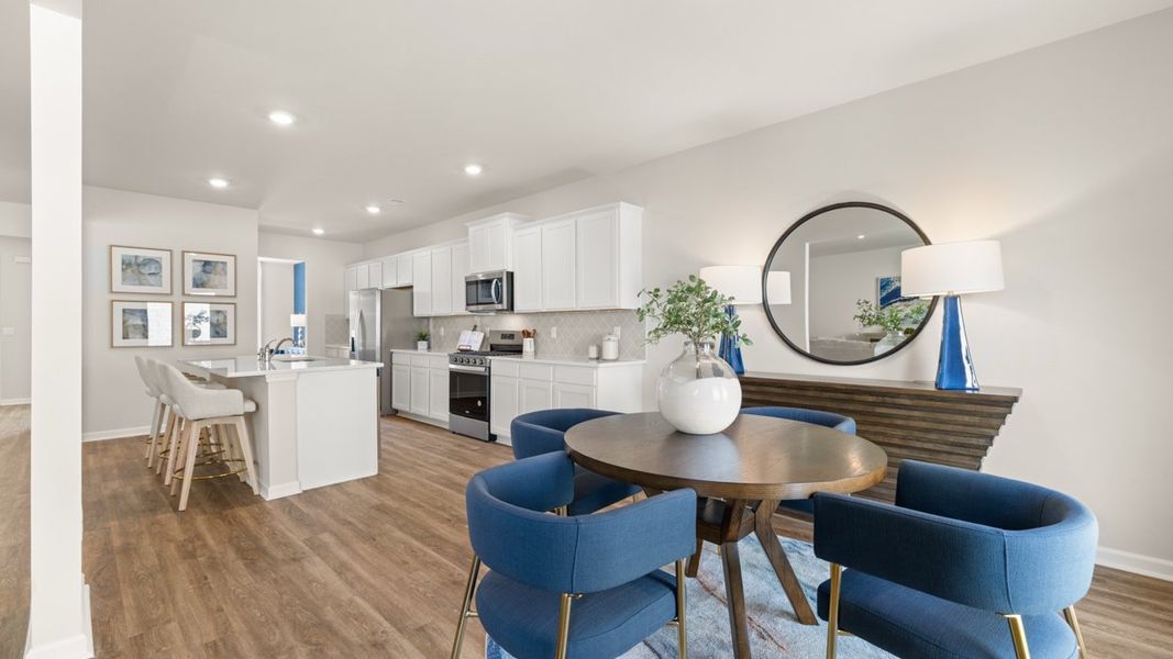 Representative furnished interior of a home built from the Halton by D.R. Horton in Brooks Station, Dacula (Image 11).