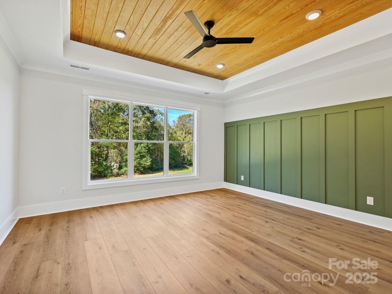 Primary Bedroom with Wooded View