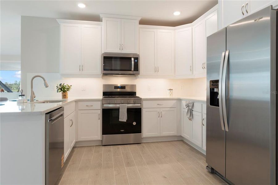 Furnished interior view inside a new home in , Punta Gorda (Image 6). Furnished interior view inside a new home in , Punta Gorda (Image 6).