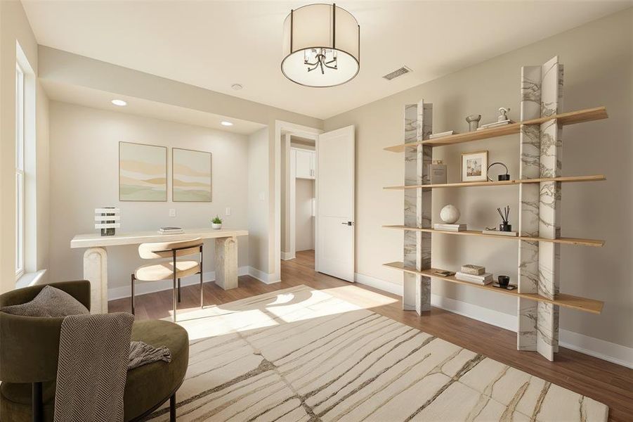 Home office with wood finished floors and recessed lighting
