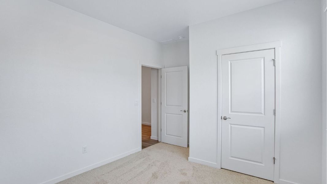 Representative unfurnished interior of a home built from the Newcastle by D.R. Horton in Westgate, Greeley (Image 21).