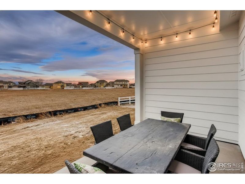 Exterior details and patio area of a home in Farmstead, Berthoud (Image 3).