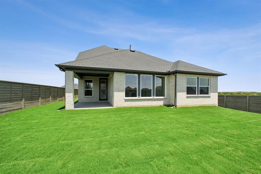 Front exterior of a new home in Treeline, Justin, TX, highlighting curb appeal (Image 1). Front exterior of a new home in Treeline, Justin, TX, highlighting curb appeal (Image 1).