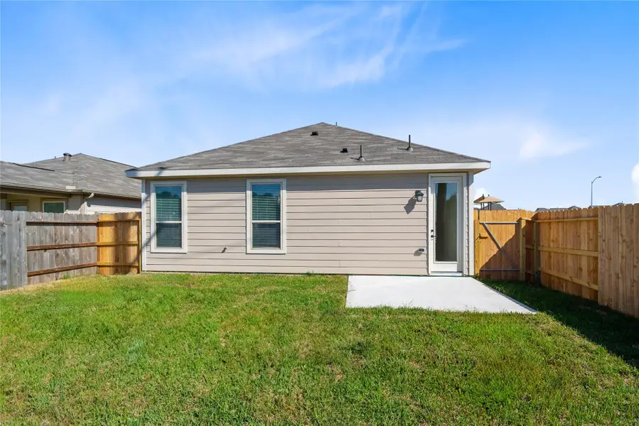 Come explore this generous backyard with patio slab—perfect for kids to play freely and adults to unwind in comfort! Come explore this generous backyard with patio slab—perfect for kids to play freely and adults to unwind in comfort!