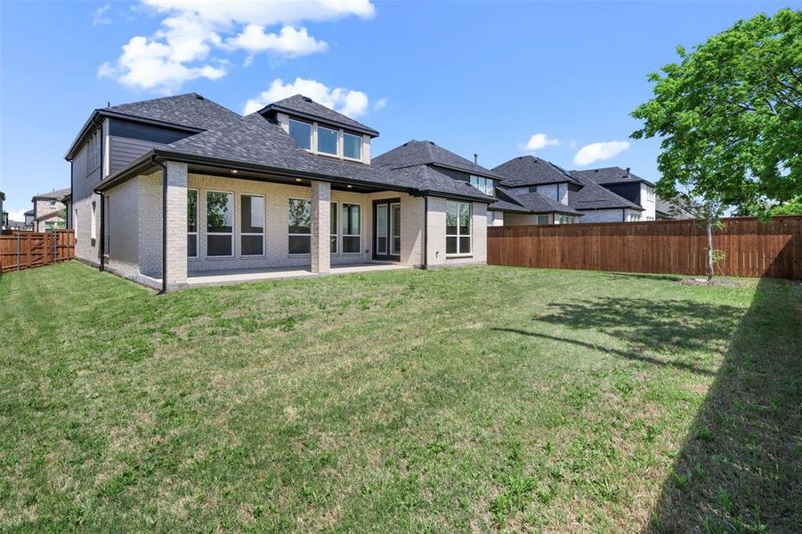Exterior details and patio area of a home in North Sky, Celina (Image 23). Exterior details and patio area of a home in North Sky, Celina (Image 23).