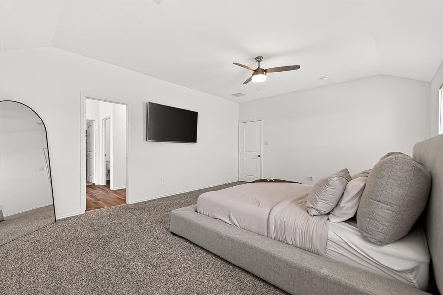 Furnished interior view inside a new home in Sunterra, Katy (Image 14).