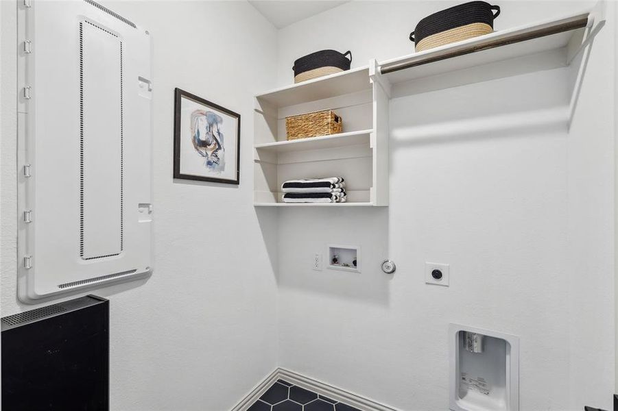 Washroom featuring gas dryer hookup, washer hookup, and hookup for an electric dryer