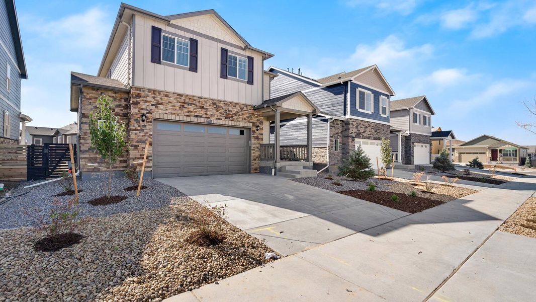 Exterior details and patio area of a home in The Ridge at Lorson Ranch, Colorado Springs (Image 1).