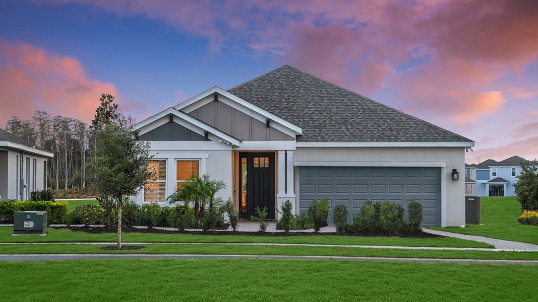 Representative exterior photo of a completed home built from the Grenada by Taylor Morrison in Westview, Poinciana, FL (Image 2). Representative exterior photo of a completed home built from the Grenada by Taylor Morrison in Westview, Poinciana, FL (Image 2).