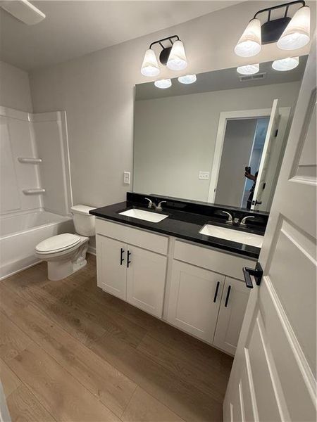 Furnished interior view inside a new home in The Fairways at Mirror Lake, Villa Rica (Image 7).