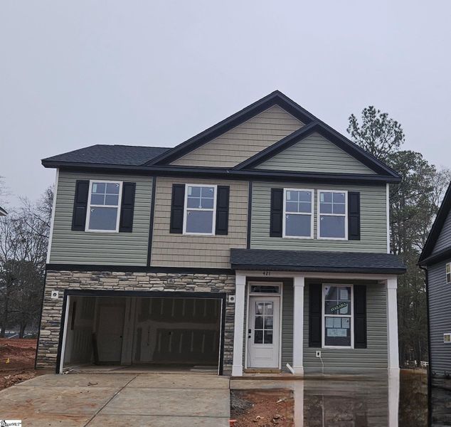 Front exterior of a new home in Sedona, Greenville, SC, highlighting curb appeal (Image 2). Front exterior of a new home in Sedona, Greenville, SC, highlighting curb appeal (Image 2).