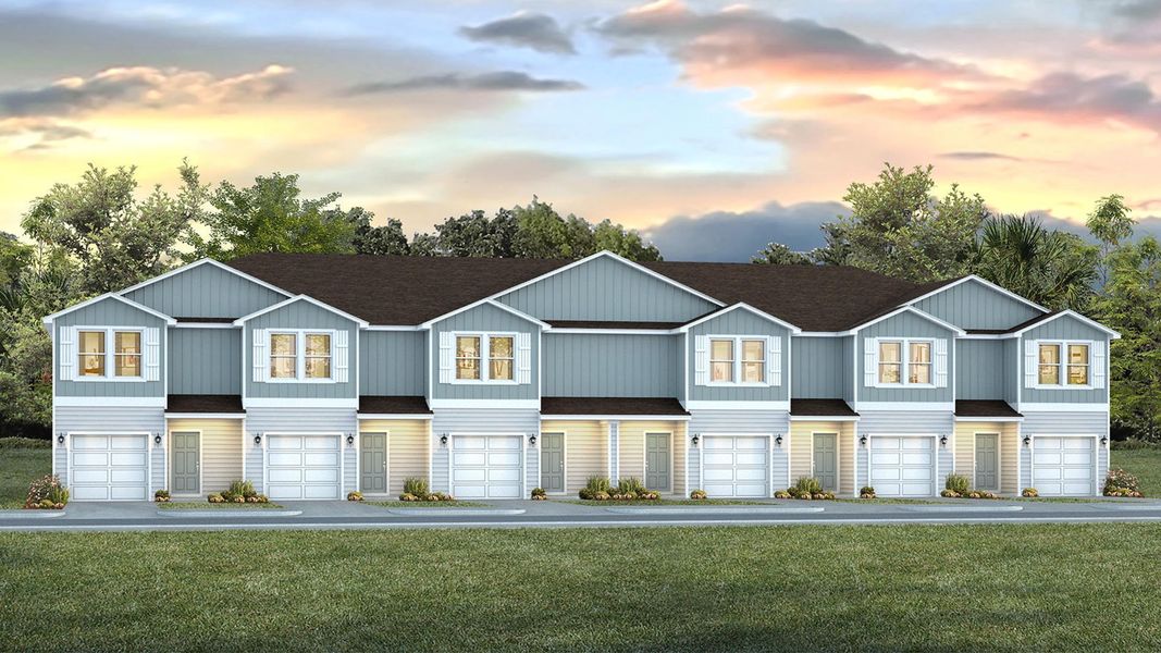 Front exterior of a new home in Palm Street Townhomes, Destin, FL, highlighting curb appeal (Image 1).