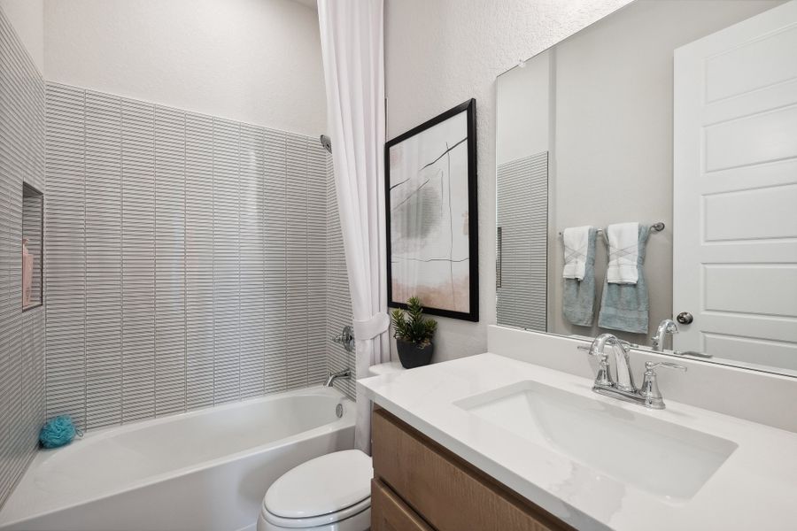 Representative furnished interior of a home built from the Elgin by Scott Felder Homes in Prominence, San Antonio (Image 34). Representative furnished interior of a home built from the Elgin by Scott Felder Homes in Prominence, San Antonio (Image 34).
