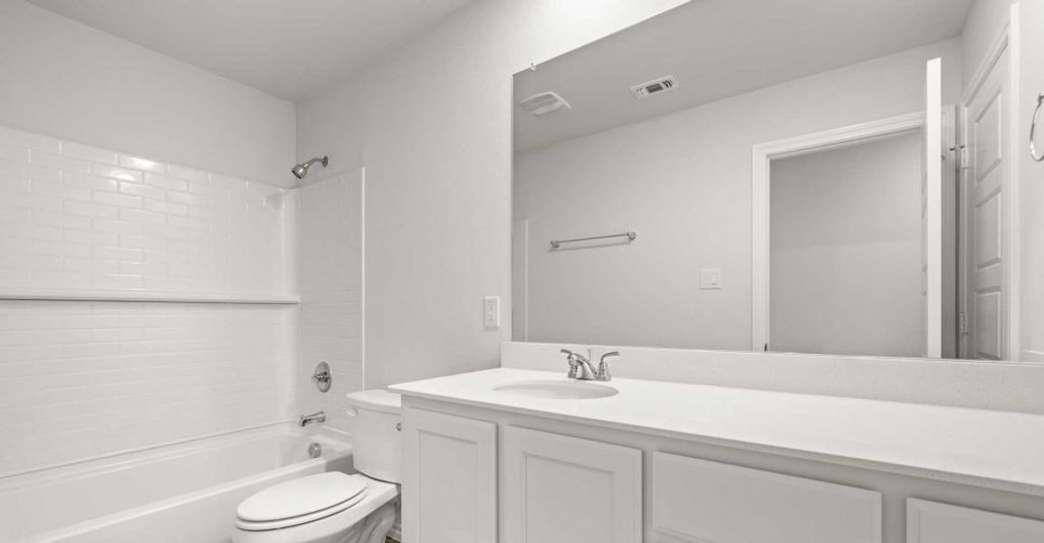 Representative exterior photo of a completed home built from the Dozier by Impression Homes in Redden Farms, Midlothian, TX (Image 20). Representative exterior photo of a completed home built from the Dozier by Impression Homes in Redden Farms, Midlothian, TX (Image 20).