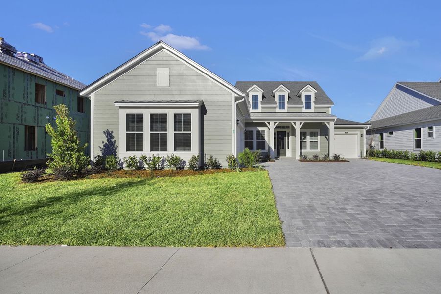 Representative exterior photo of a completed home built from the Riverdale by Riverside Homes in Hidden Creek at SilverLeaf, St. Augustine, FL (Image 24). Representative exterior photo of a completed home built from the Riverdale by Riverside Homes in Hidden Creek at SilverLeaf, St. Augustine, FL (Image 24).