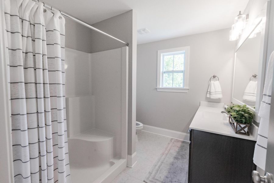 Representative furnished interior of a home built from the Helmsley by Bill Clark Homes in The Sanctuary at Sunset Beach, Sunset Beach (Image 52). Representative furnished interior of a home built from the Helmsley by Bill Clark Homes in The Sanctuary at Sunset Beach, Sunset Beach (Image 52).