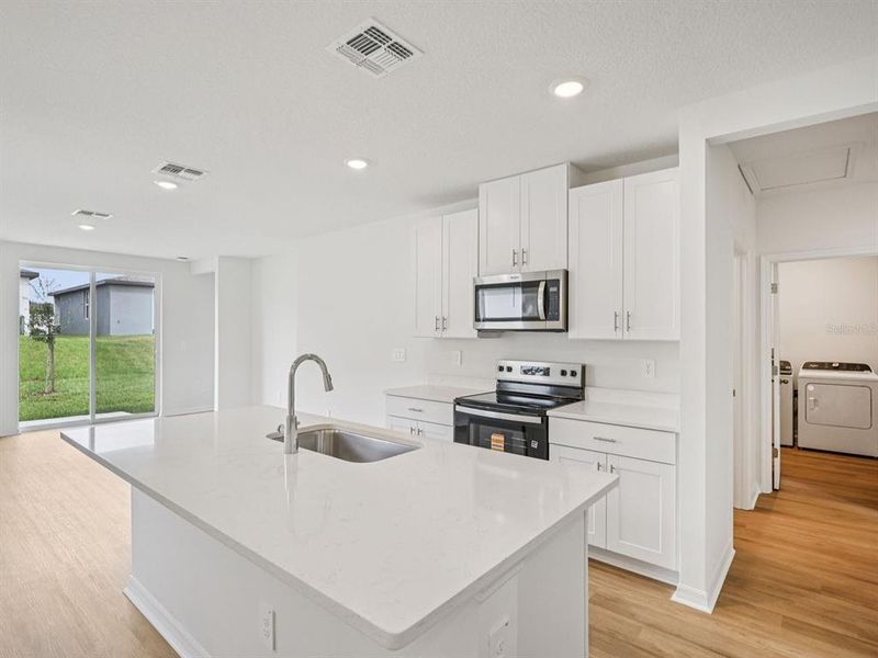 Furnished interior view inside a new home in Benton Hills - Premier Series, Brooksville (Image 5).