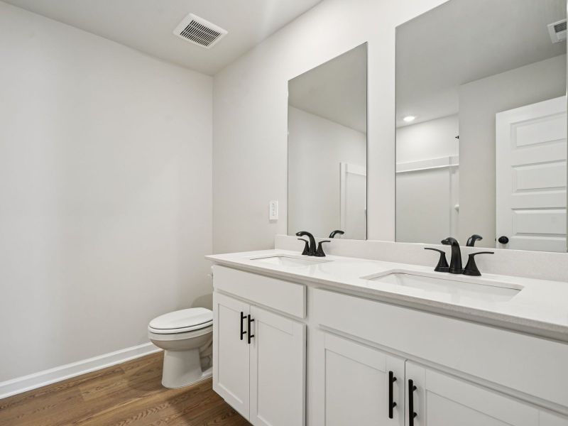 The Taylorsville floorplan with the Divine White interior package.