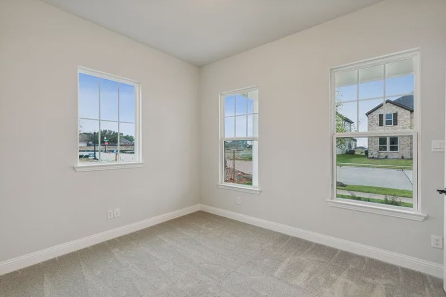 Representative unfurnished interior of a home built from the Logan by Cambridge Homes in Lake Park, Rowlett (Image 15).