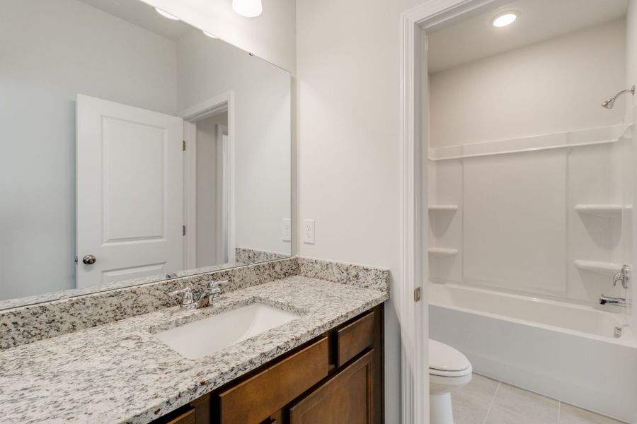 Furnished interior view inside a new home in Pecan Orchard, Elgin (Image 12).