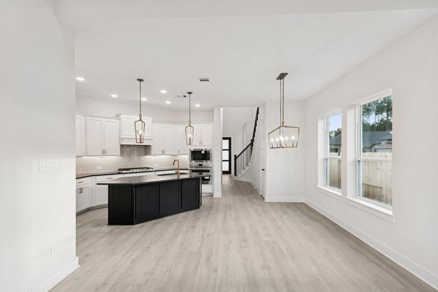 Furnished interior view inside a new home in The Highlands 40', Porter (Image 5).