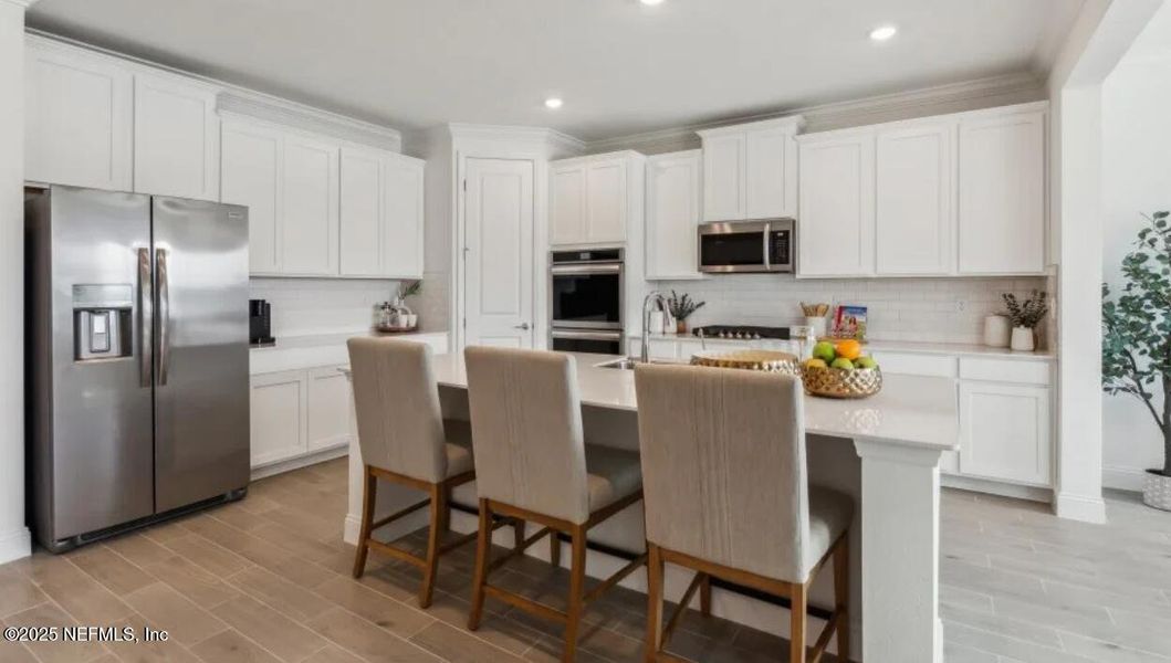 Furnished interior view inside a new home in Silver Meadows at SilverLeaf: Silver Meadows 60s, St. Augustine (Image 16).