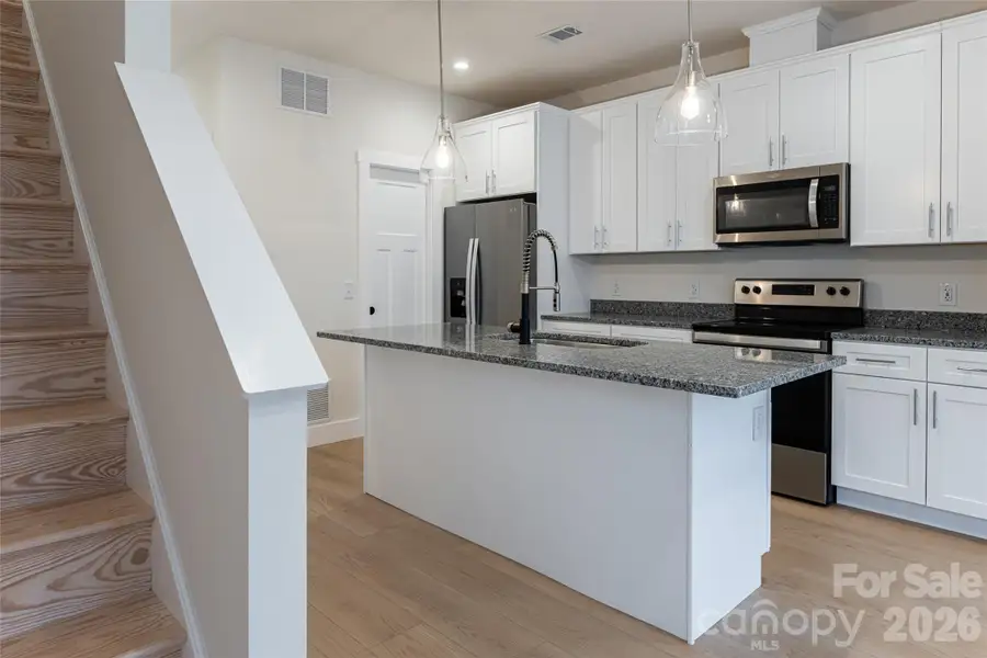 Furnished interior view inside a new home in , Asheville (Image 4).