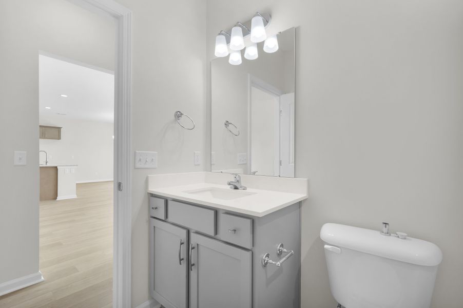 Representative furnished interior of a home built from the The Magnolia by Smith Family Homes in Lakeview Pines, Statesboro (Image 32).