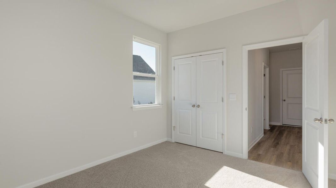 Spacious, unfurnished interior of a new home in Indigo Preserve, Leland (Image 25).