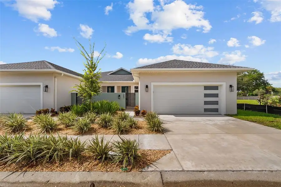Front exterior of a new home in , Tarpon Springs, FL, highlighting curb appeal (Image 2). Front exterior of a new home in , Tarpon Springs, FL, highlighting curb appeal (Image 2).