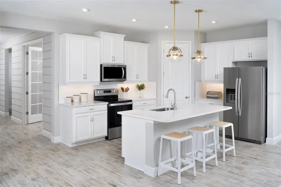 Furnished interior view inside a new home in Windwater, Parrish (Image 3).