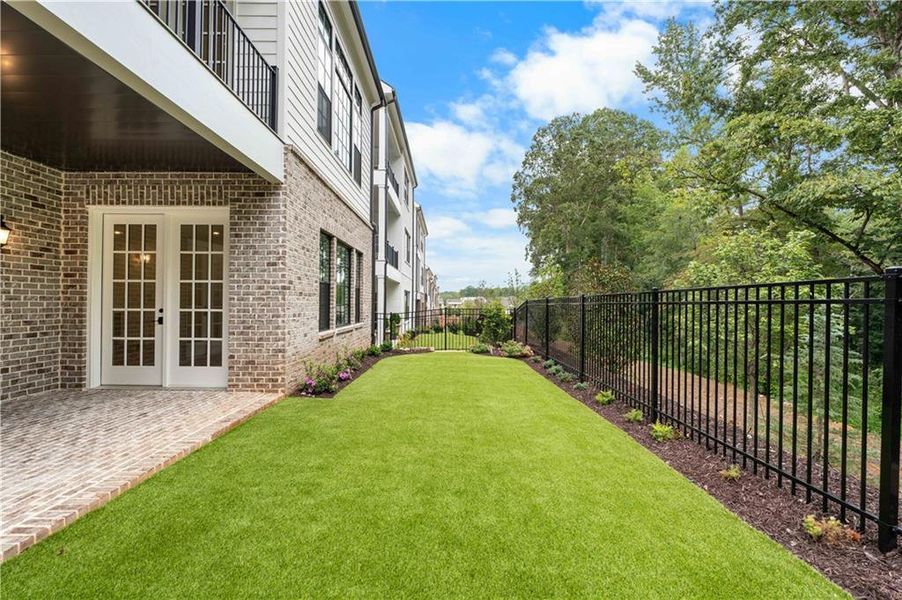 Exterior details and patio area of a home in Waterside Single Family, Peachtree Corners (Image 3). Exterior details and patio area of a home in Waterside Single Family, Peachtree Corners (Image 3).