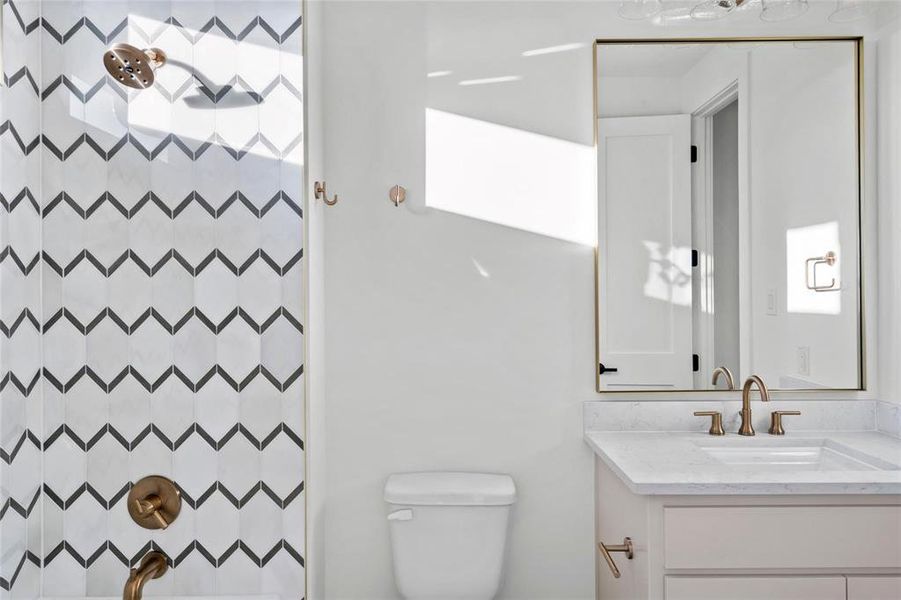 Bathroom with vanity and a shower with curtain Bathroom with vanity and a shower with curtain