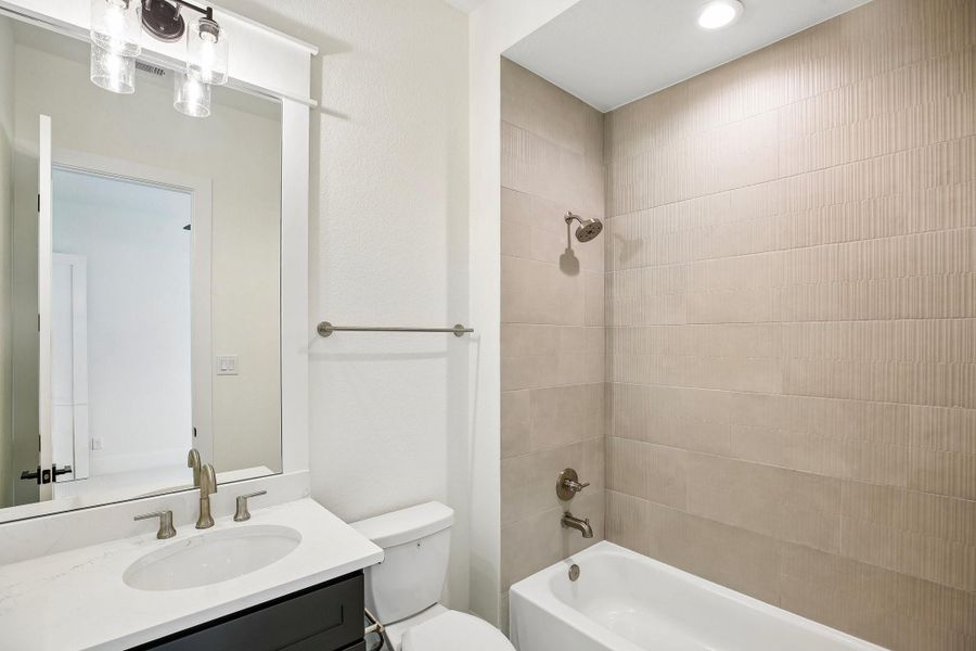 Furnished interior view inside a new home in Homestead Hill, New Waverly (Image 4).