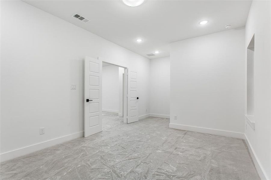 Unfurnished room with baseboards and recessed lighting Unfurnished room with baseboards and recessed lighting