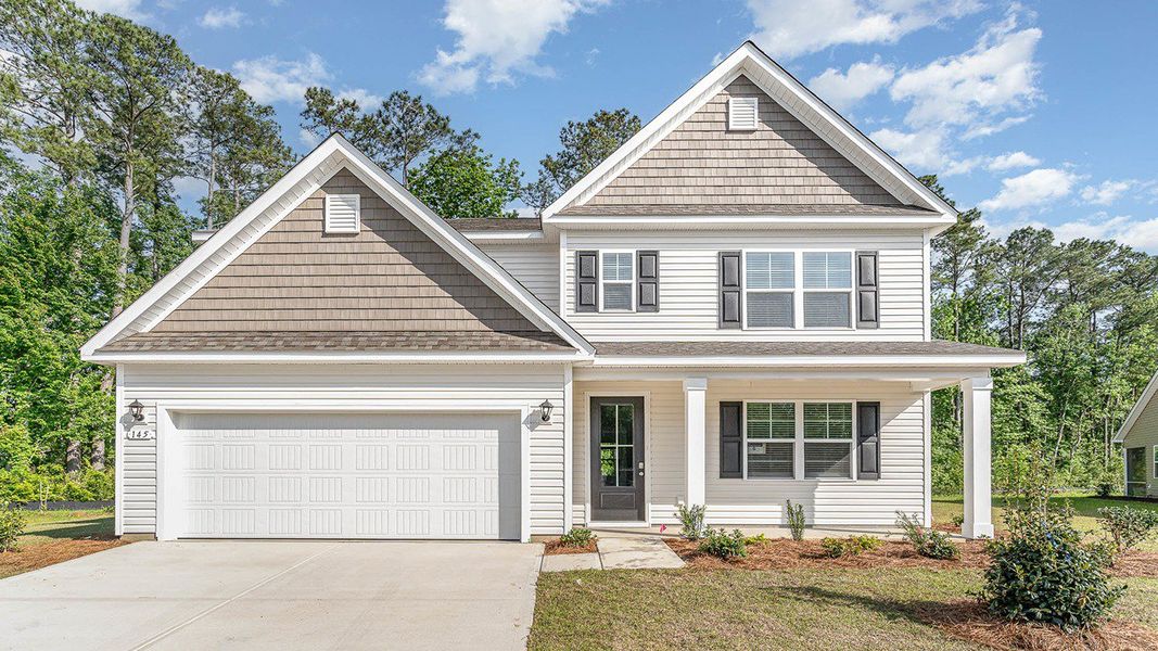 Representative exterior photo of a completed home built from the Harbor Oak by D.R. Horton in Brunswick Plantation, Ash, NC (Image 17). Representative exterior photo of a completed home built from the Harbor Oak by D.R. Horton in Brunswick Plantation, Ash, NC (Image 17).