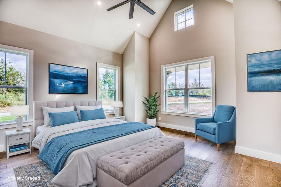 Virtually staged primary suite with cathedral ceiling Virtually staged primary suite with cathedral ceiling