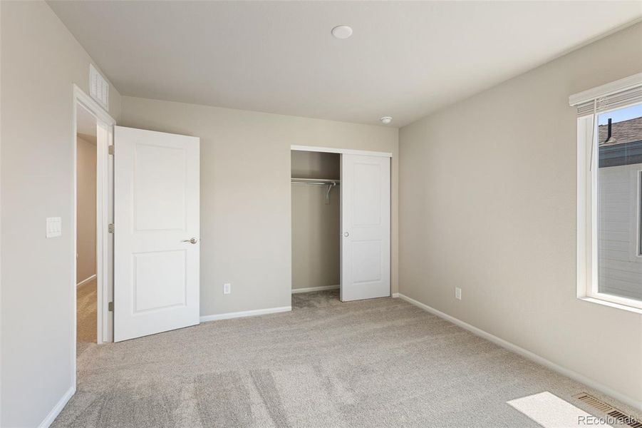 Spacious, unfurnished interior of a new home in Woodrose at Painted Prairie, Aurora (Image 29).