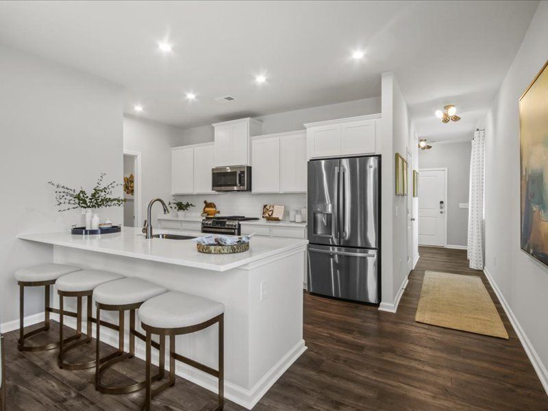 Furnished interior view inside a new home in Wyndermere, Greenville (Image 1).