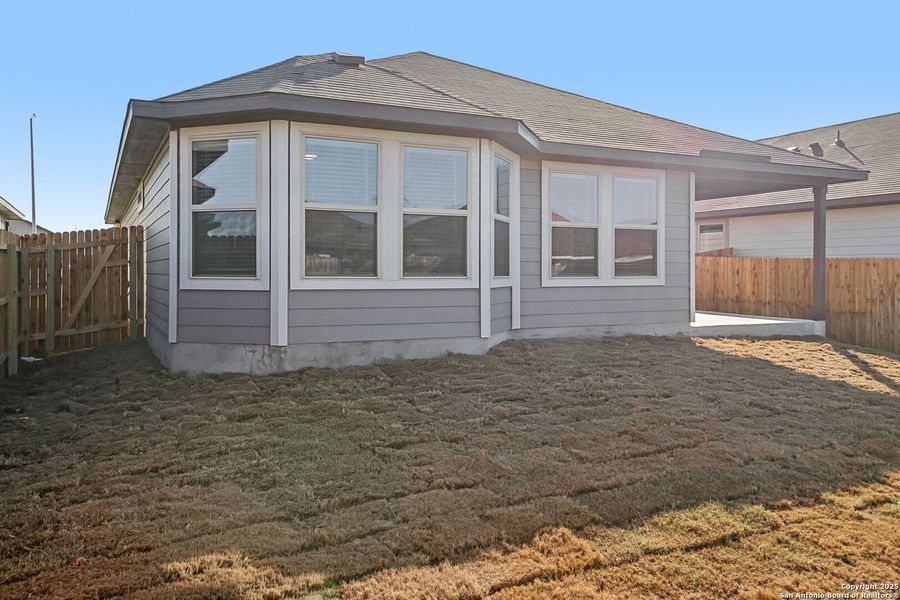 Exterior details and patio area of a home in Catalina, Converse (Image 25).