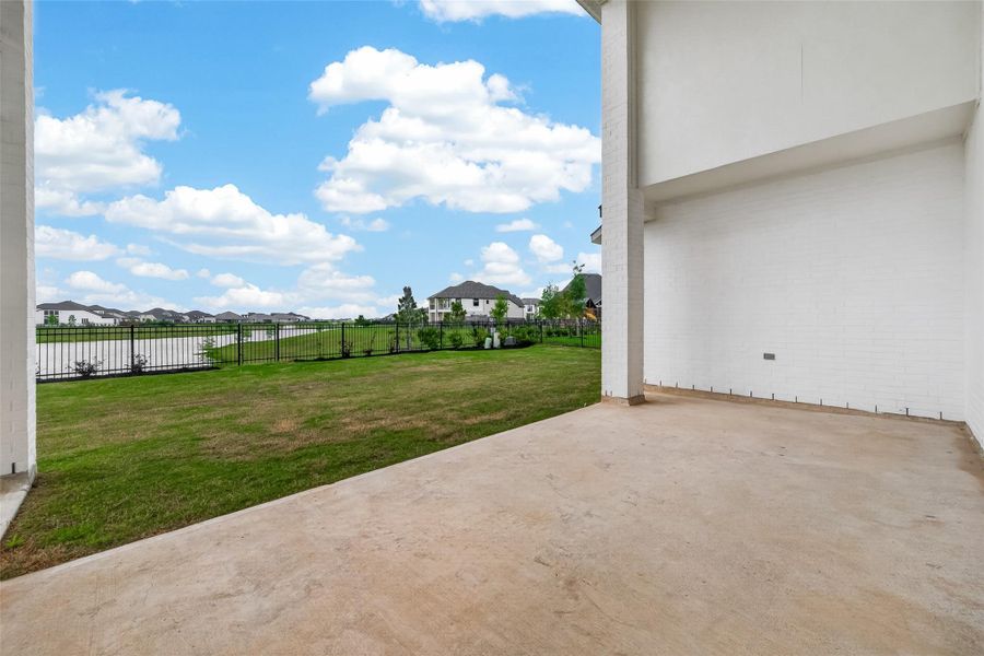 Exterior details and patio area of a home in , Brookshire (Image 26).