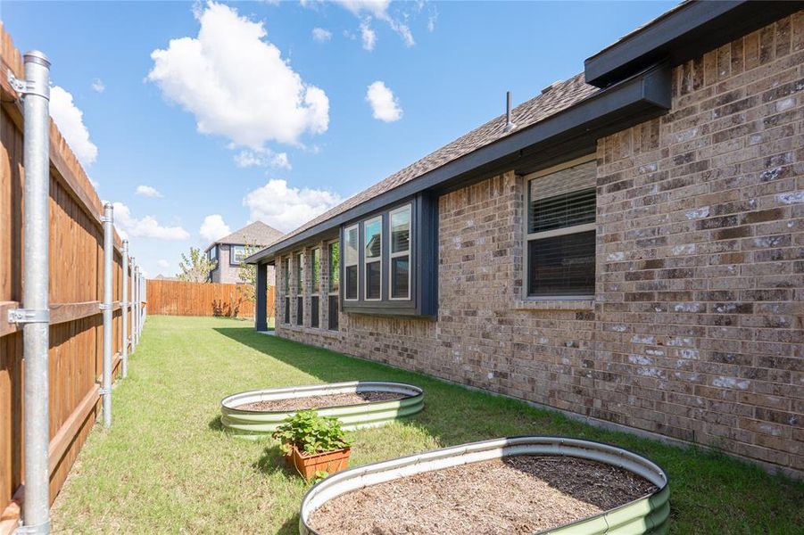 Exterior details and patio area of a home in The Oasis at North Grove 60-70, Waxahachie (Image 3). Exterior details and patio area of a home in The Oasis at North Grove 60-70, Waxahachie (Image 3).