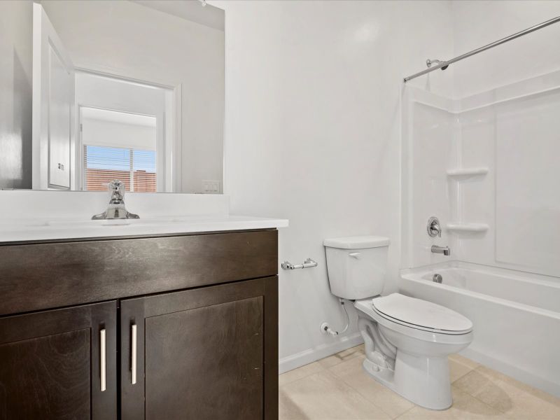 Furnished interior view inside a new home in Sunset Crest - Signature Series, Tucson (Image 7).
