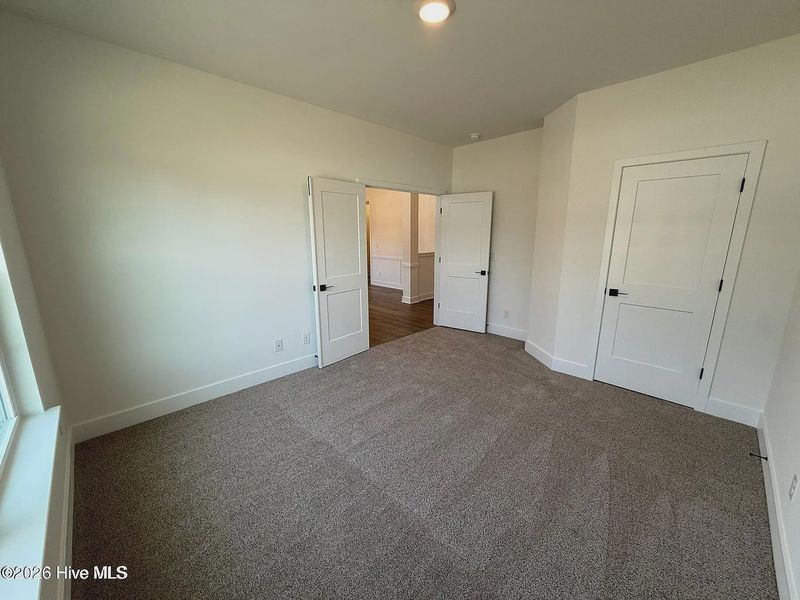 Spacious, unfurnished interior of a new home in Wood Creek Landing, Leland (Image 15).