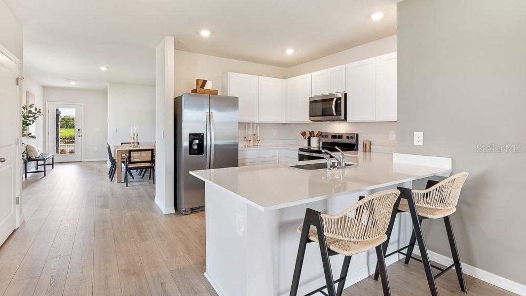 Furnished interior view inside a new home in Oakfield Trails, Parrish (Image 6).