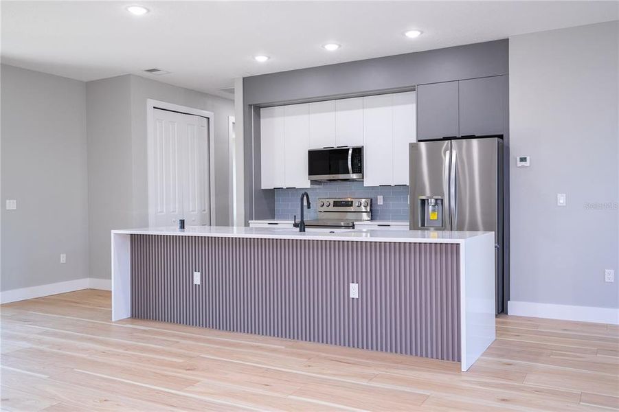 Furnished interior view inside a new home in , Port Charlotte (Image 3). Furnished interior view inside a new home in , Port Charlotte (Image 3).