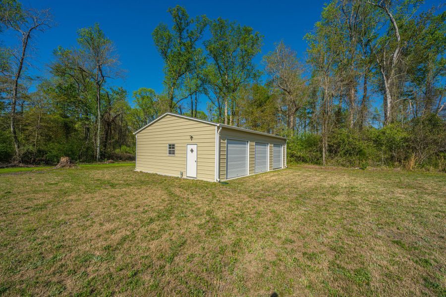 Exterior details and patio area of a home in , Cottageville (Image 22).