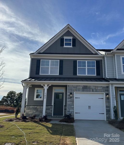 Front exterior of a new home in , Waxhaw, NC, highlighting curb appeal (Image 1). Front exterior of a new home in , Waxhaw, NC, highlighting curb appeal (Image 1).