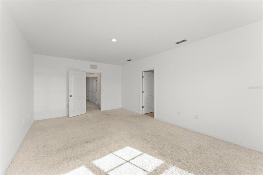 Spacious, unfurnished interior of a new home in Grace Ranch, Haines City (Image 18). Spacious, unfurnished interior of a new home in Grace Ranch, Haines City (Image 18).